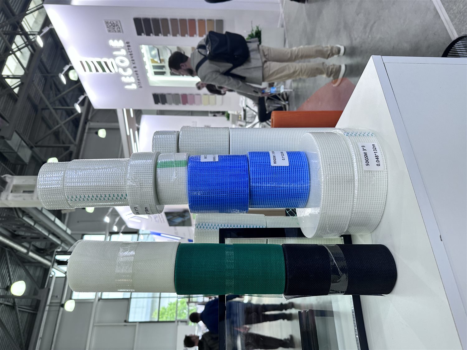 Fiberglass mesh products displayed at a trade show