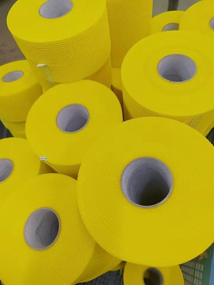 Yellow fiberglass mesh tape rolls