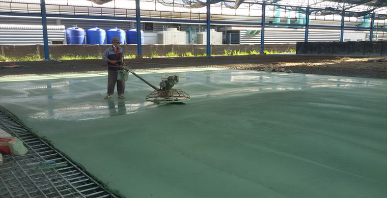 Non-metallic floor hardener applied to an industrial concrete floor